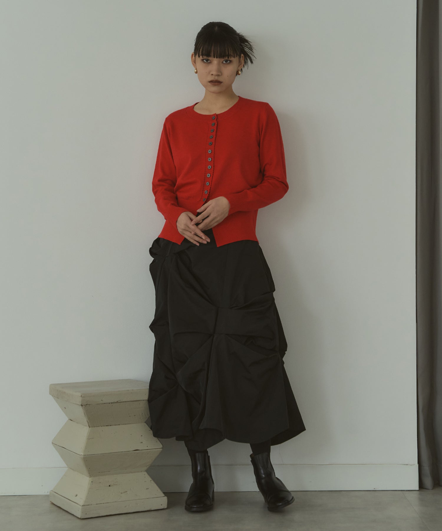 メニーボタンスリットカーデ