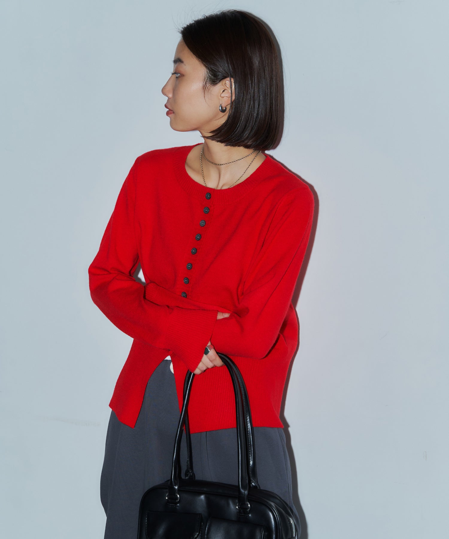 メニーボタンスリットカーデ