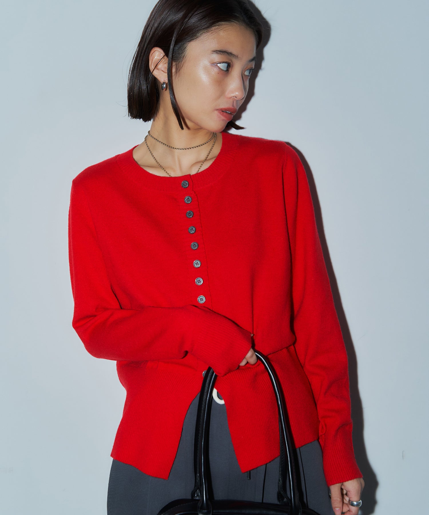 メニーボタンスリットカーデ