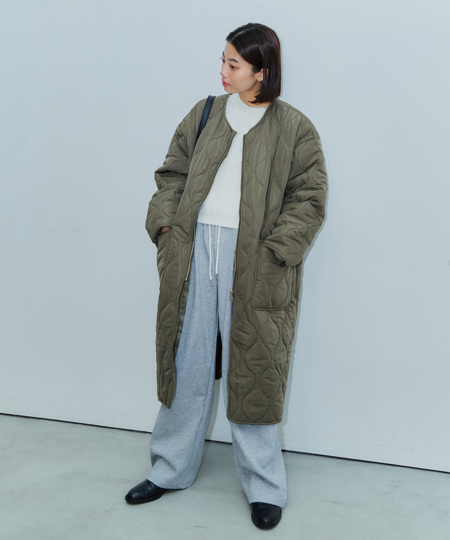 ノーカラーキルティングロングコート