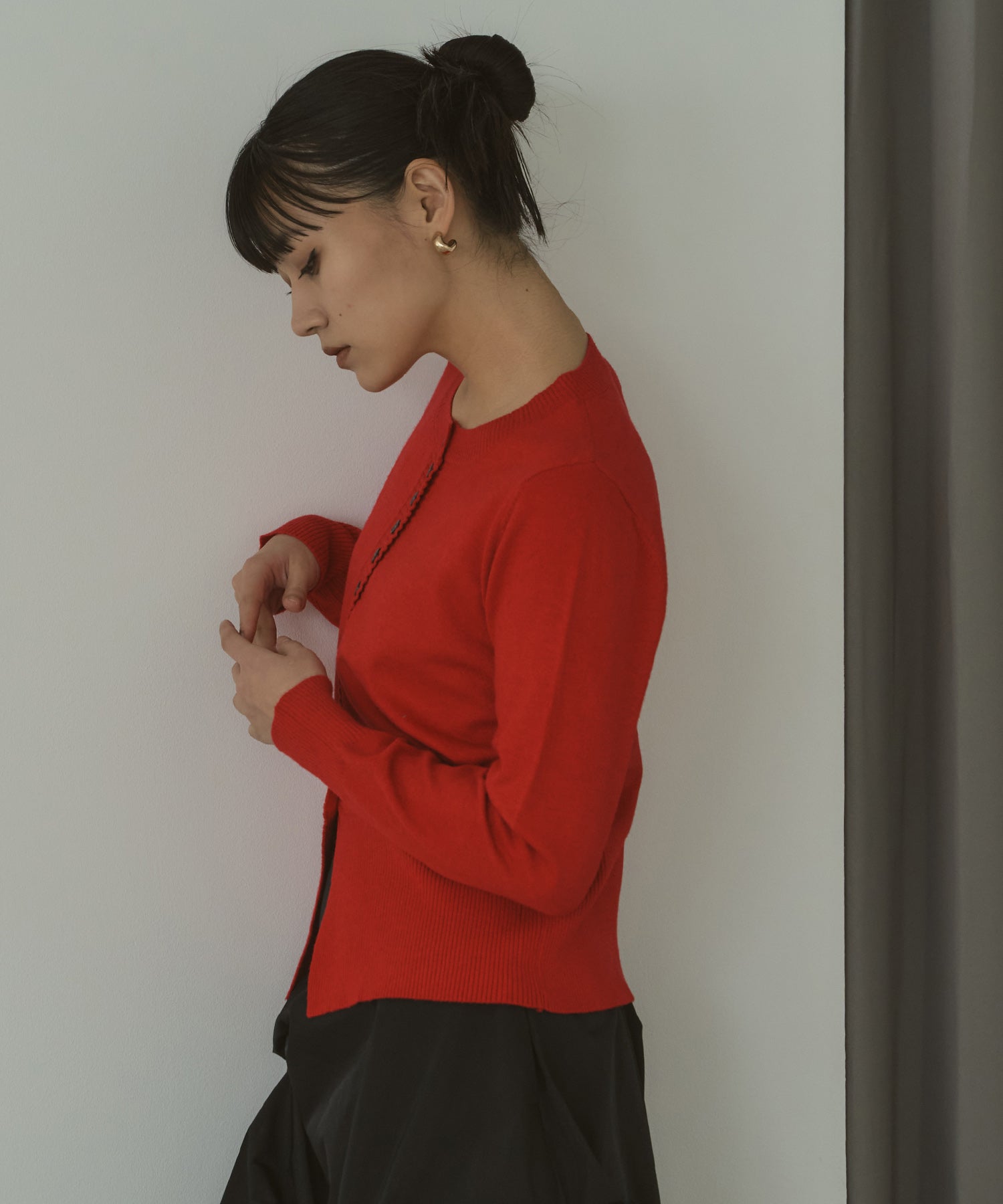 メニーボタンスリットカーデ