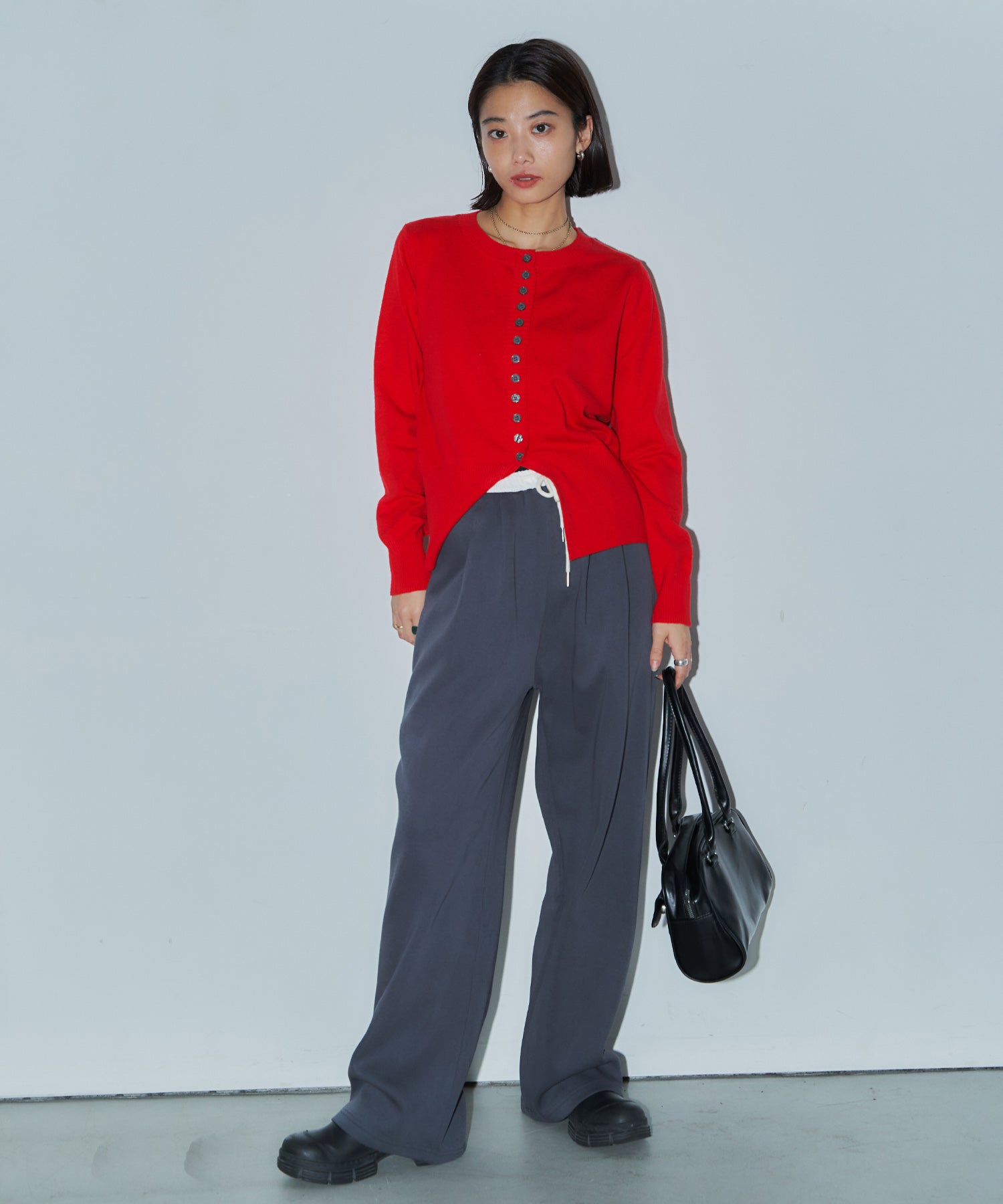 メニーボタンスリットカーデ