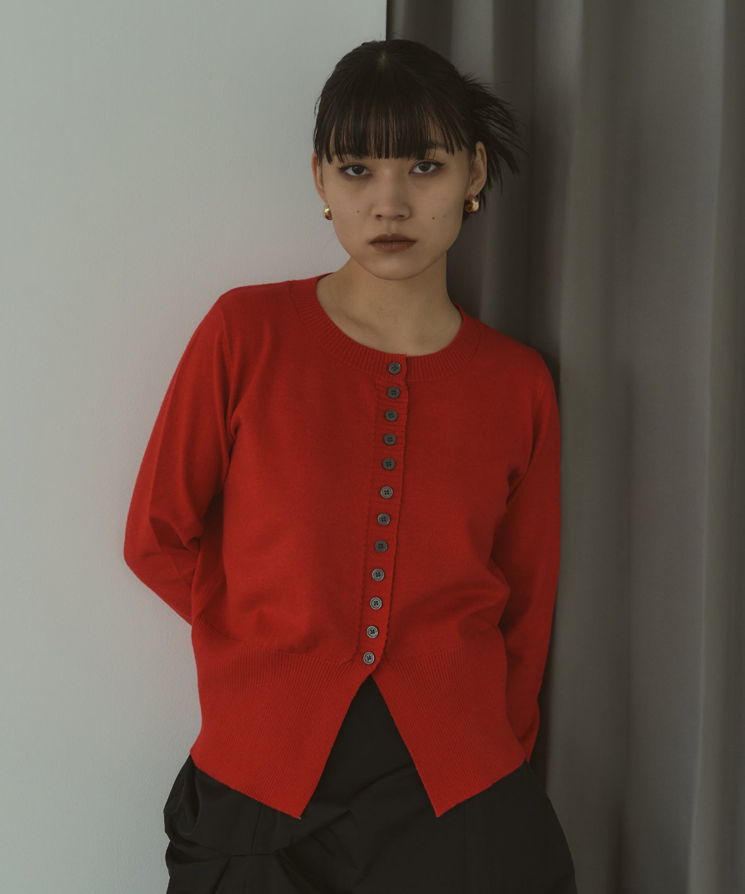 メニーボタンスリットカーデ