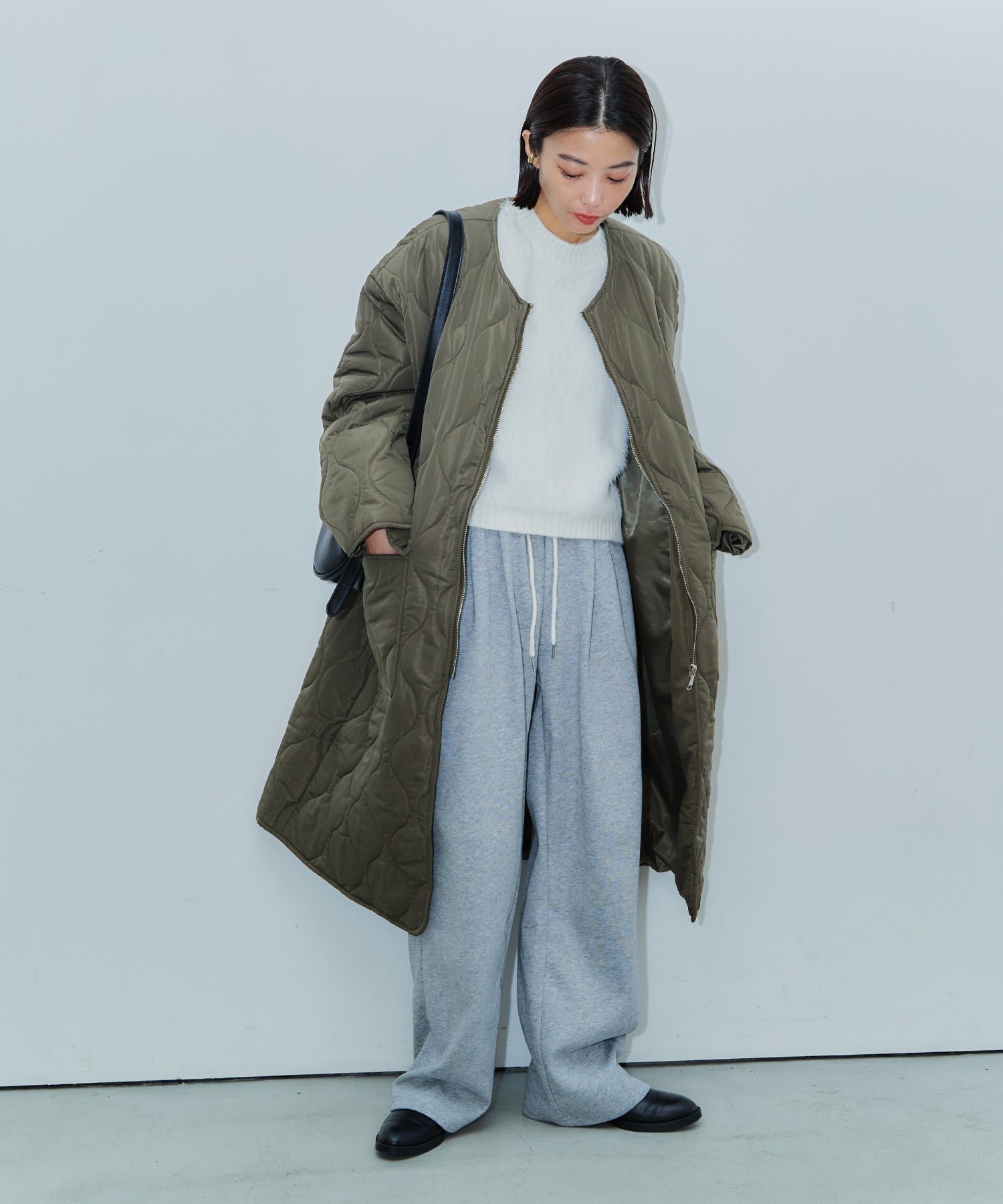 ノーカラーキルティングロングコート