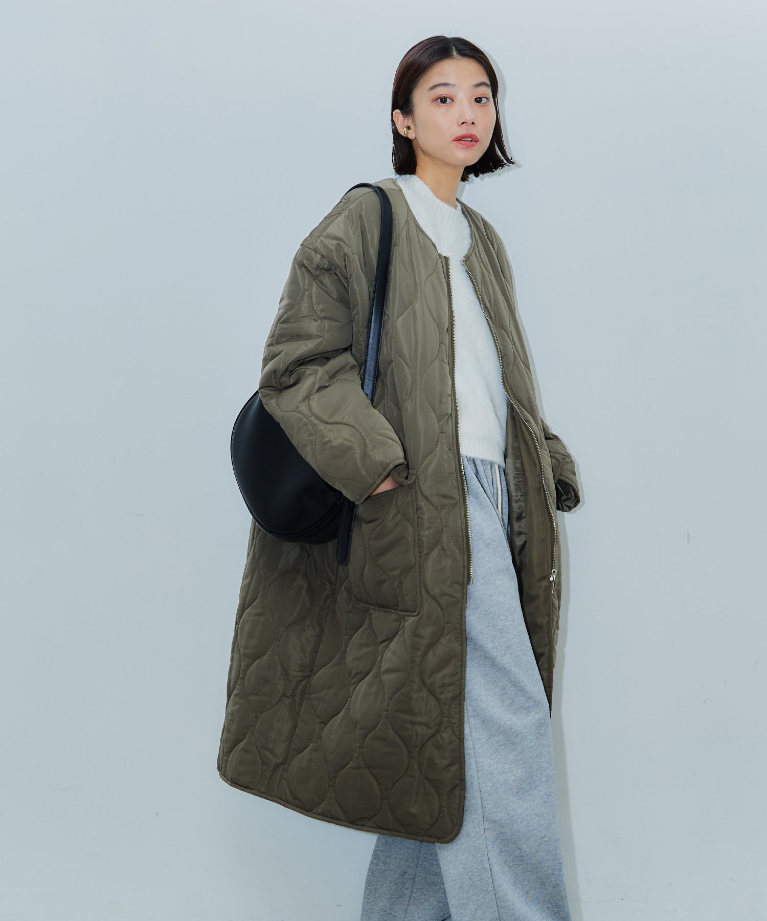 ノーカラーキルティングロングコート