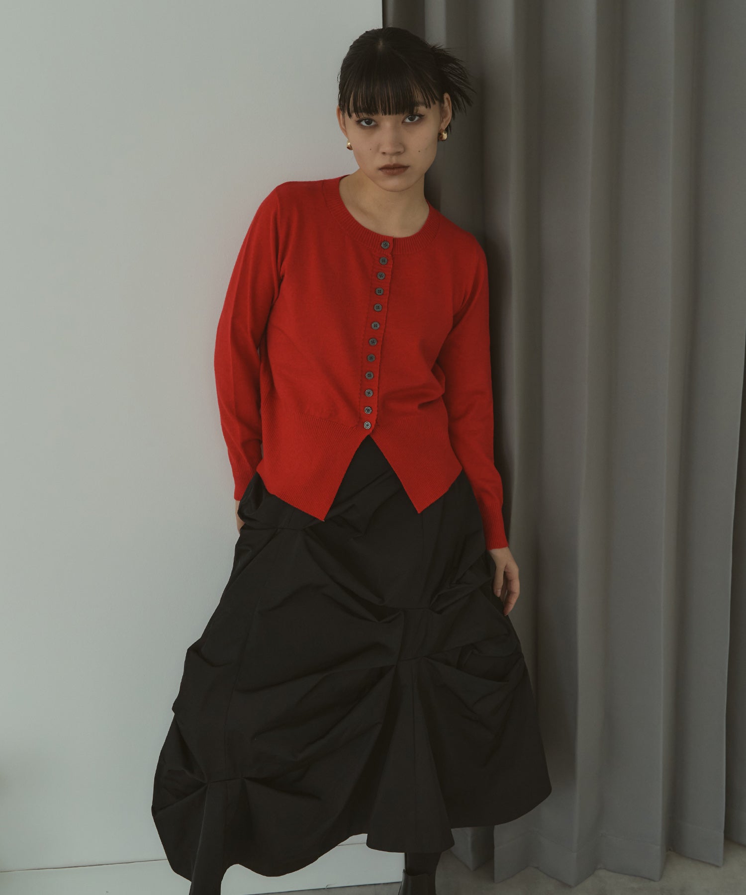 メニーボタンスリットカーデ